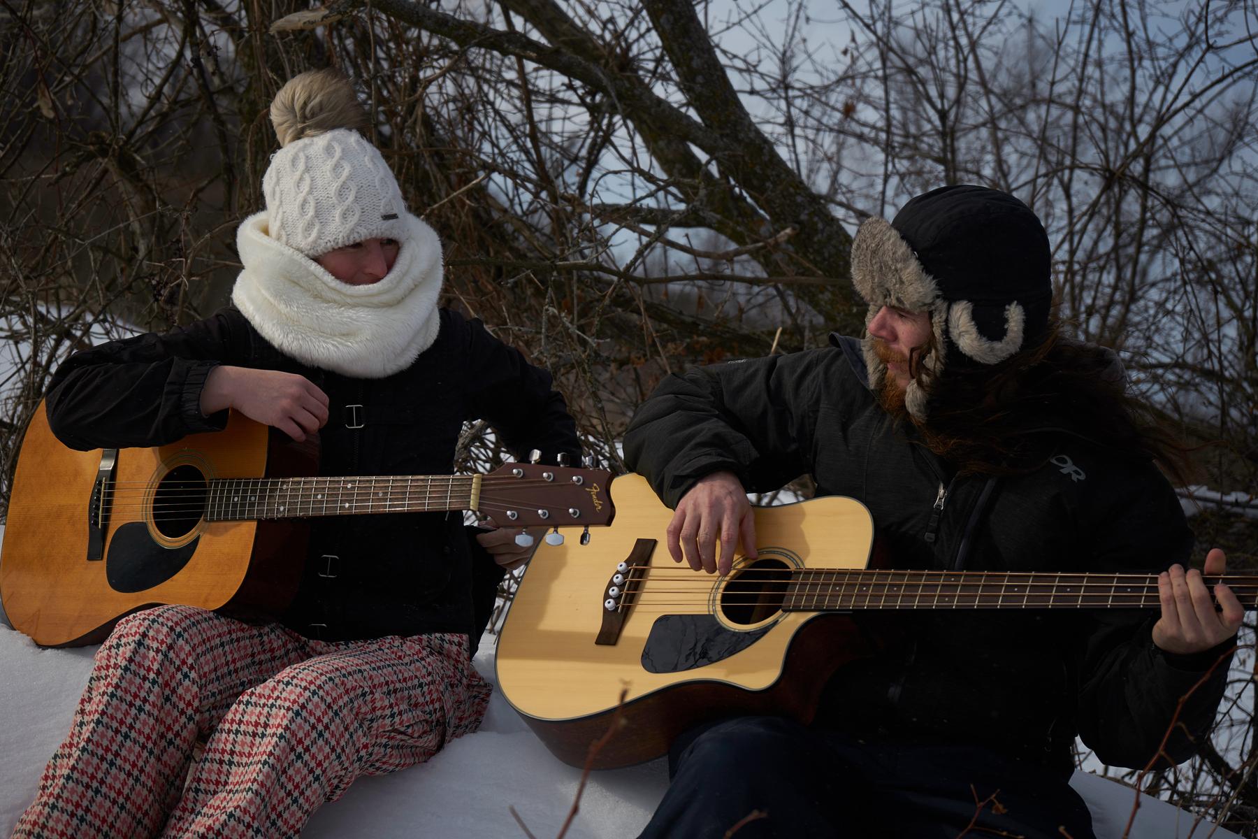 Closeup Jenn and Matt jamming in the snow