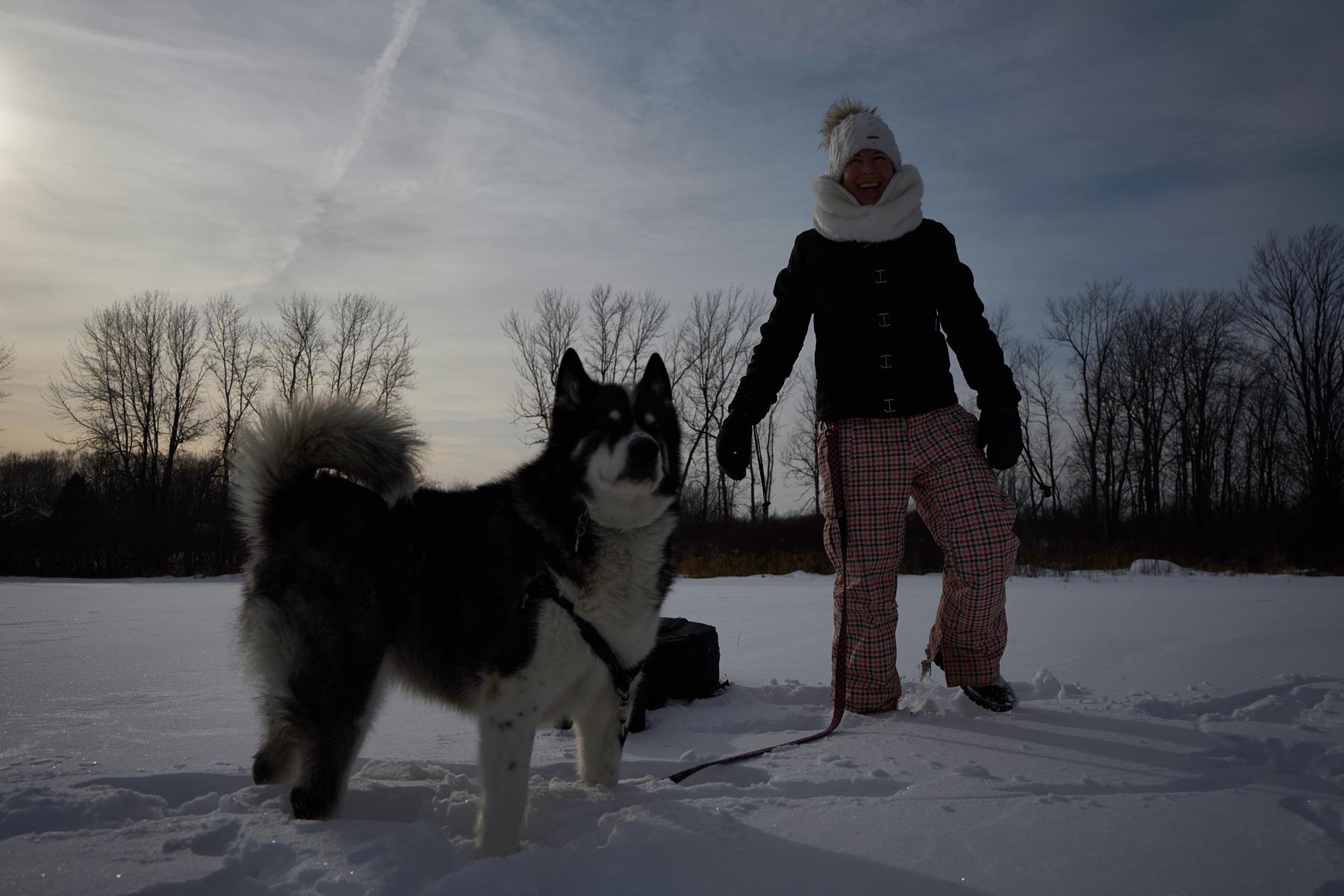 Jenn balanced on one leg with Shadow
