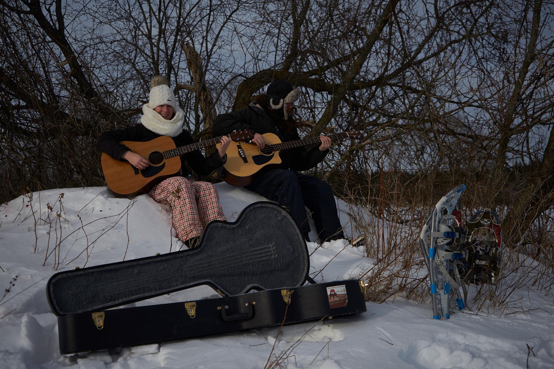 Jenn and Matt jamming on a snowbank