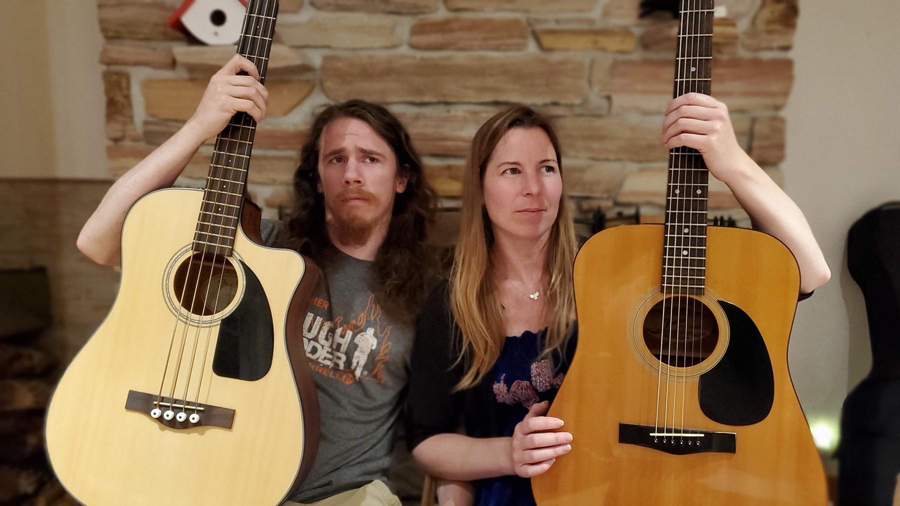 Jenn and Matt looking sketchy with their instruments