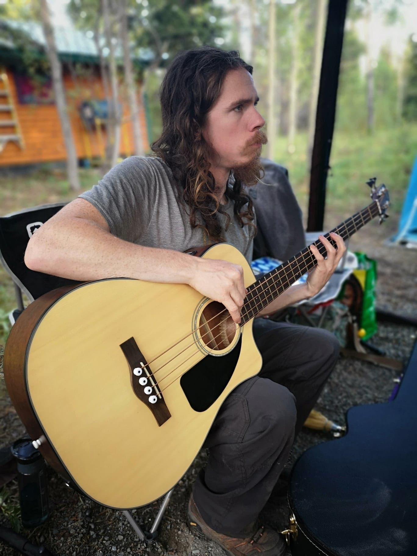 Matt looking bored on bass