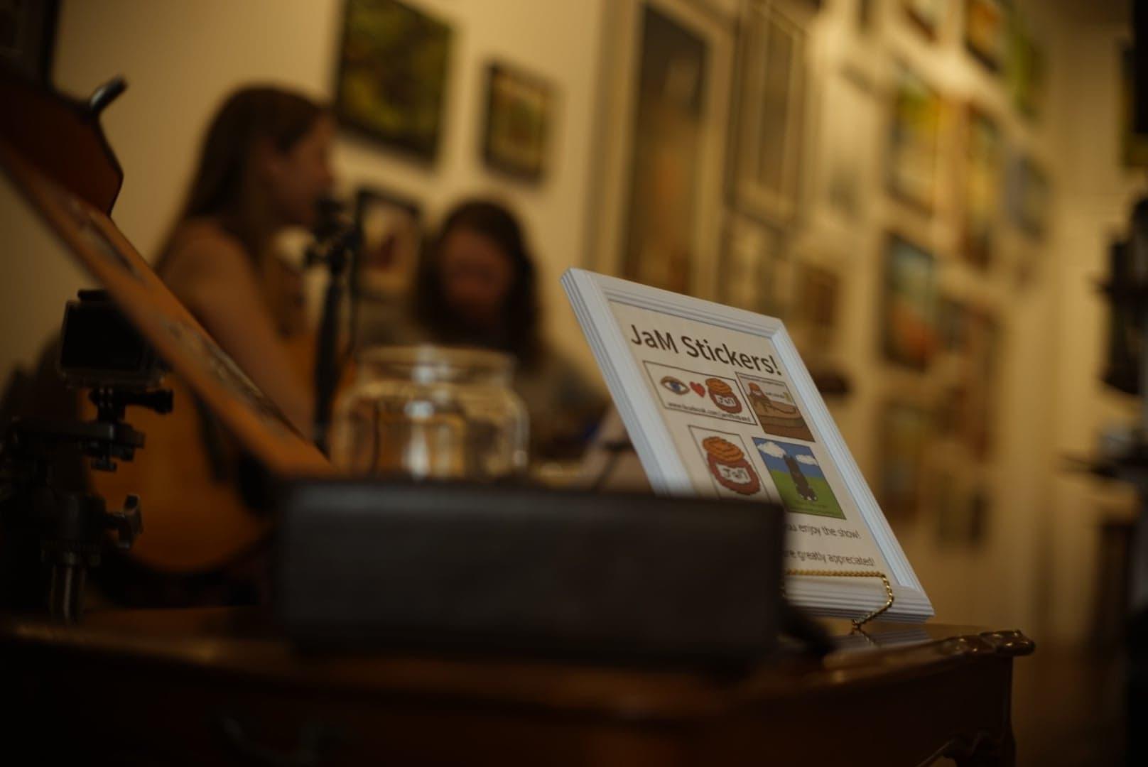 Jamming behind the merch table